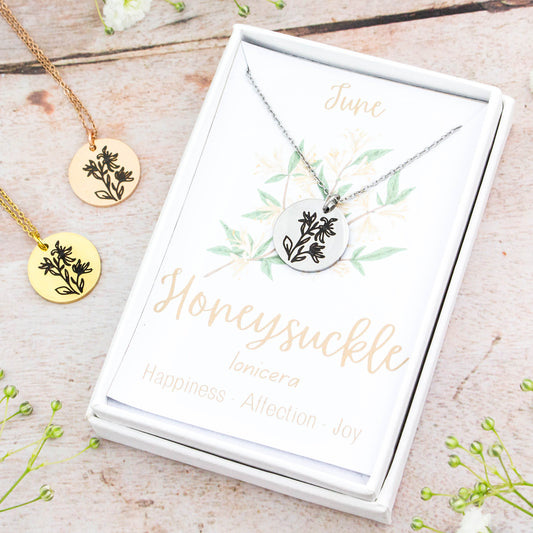 A beautiful birth flower necklace featuring June's birth flower – Honeysuckle. The necklace is available in silver, gold or rose gold stainless steel and can be personalised with an engraving on the reverse.
