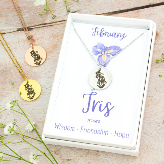 A beautiful birth flower necklace featuring February's birth flower - the Iris. The necklace is available in silver, gold or rose gold stainless steel and can be personalised with an engraving on the reverse.