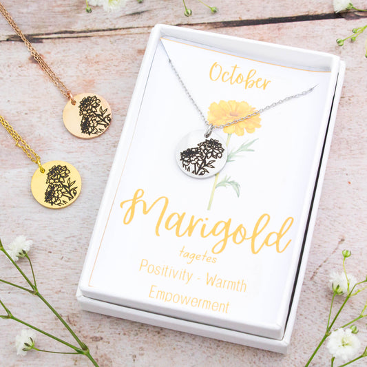 A beautiful birth flower necklace featuring October’s birth flower – Marigold. The necklace is available in silver, gold or rose gold stainless steel and can be personalised with an engraving on the reverse.