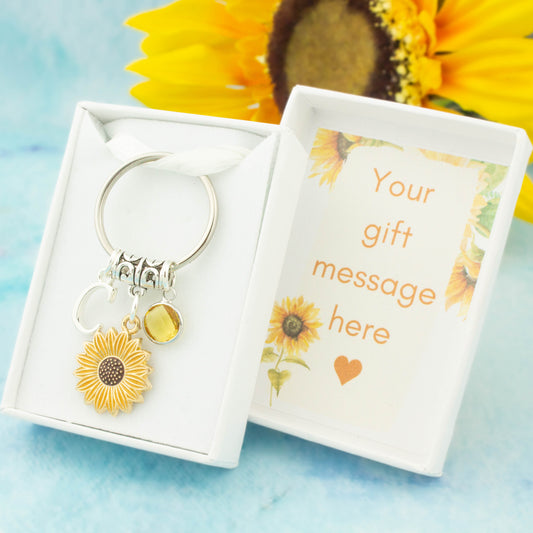 Yellow Sunflower charm keyring with an initial and birthstone. Presented in a gift box with a personalised message insert.