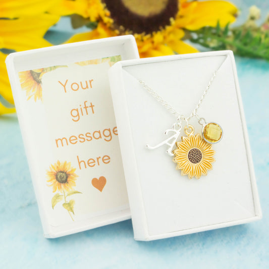 Yellow sunflower charm necklace with an initial and birthstone. Presented in a gift box with a personalised message insert.