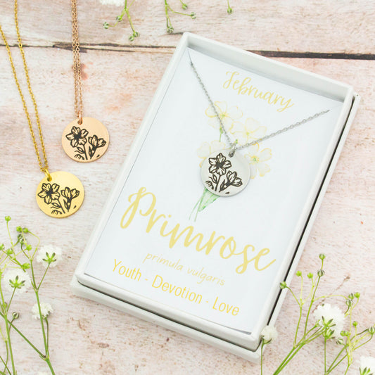 A beautiful birth flower necklace featuring February's birth flower - the Primrose. The necklace is available in silver, gold or rose gold stainless steel and can be personalised with an engraving on the reverse.