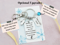 This infographic shows the optional upgrades for your travel Penguin keyring. You can add a clasp to clip it to a bag, you can add a birthstone and  this personalised version comes with a mini tag that you can engrave with a short gift message. 