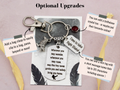 This infographic shows the optional upgrades for your travel raven keyring. You can add a clasp to clip it to a bag, you can add a birthstone and also a mini engraved tag with a short gift message on it. 