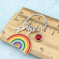 Big Rainbow Charm Keyring with initial and birthstone crystal. Silver chain.