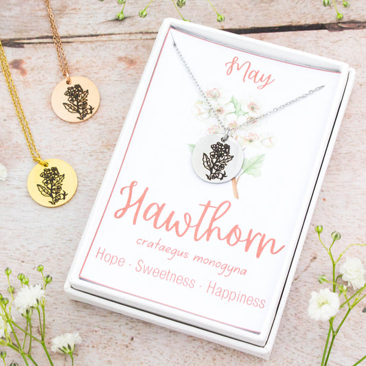 A beautiful birth flower necklace featuring May's birth flower – Hawthorn. The necklace is available in silver, gold or rose gold stainless steel and can be personalised with an engraving on the reverse. 