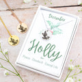 A beautiful birth flower necklace featuring December’s birth flower – Holly. The necklace is available in silver, gold or rose gold stainless steel and can be personalised with an engraving on the reverse. 