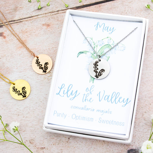 A beautiful birth flower necklace featuring May's birth flower - the Lily Of The Valley. The necklace is available in silver, gold or rose gold stainless steel and can be personalised with an engraving on the reverse.