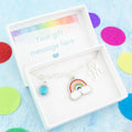 An enamel rainbow charm bracelet. It can be personalised with an initial and birthstone and comes in a personalised gift box.