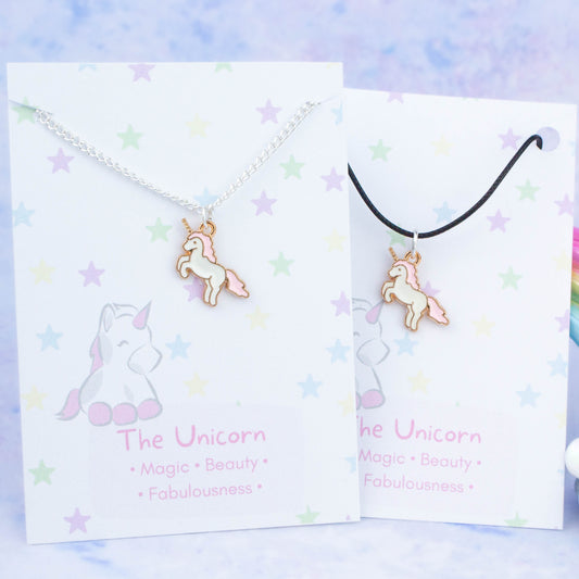 Pink unicorn charm necklace available on either silver chain or black cord.