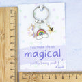 Unicorn gift keyring against a ruler.