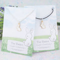 White rabbit charm necklace available on either silver chain or black cord.  